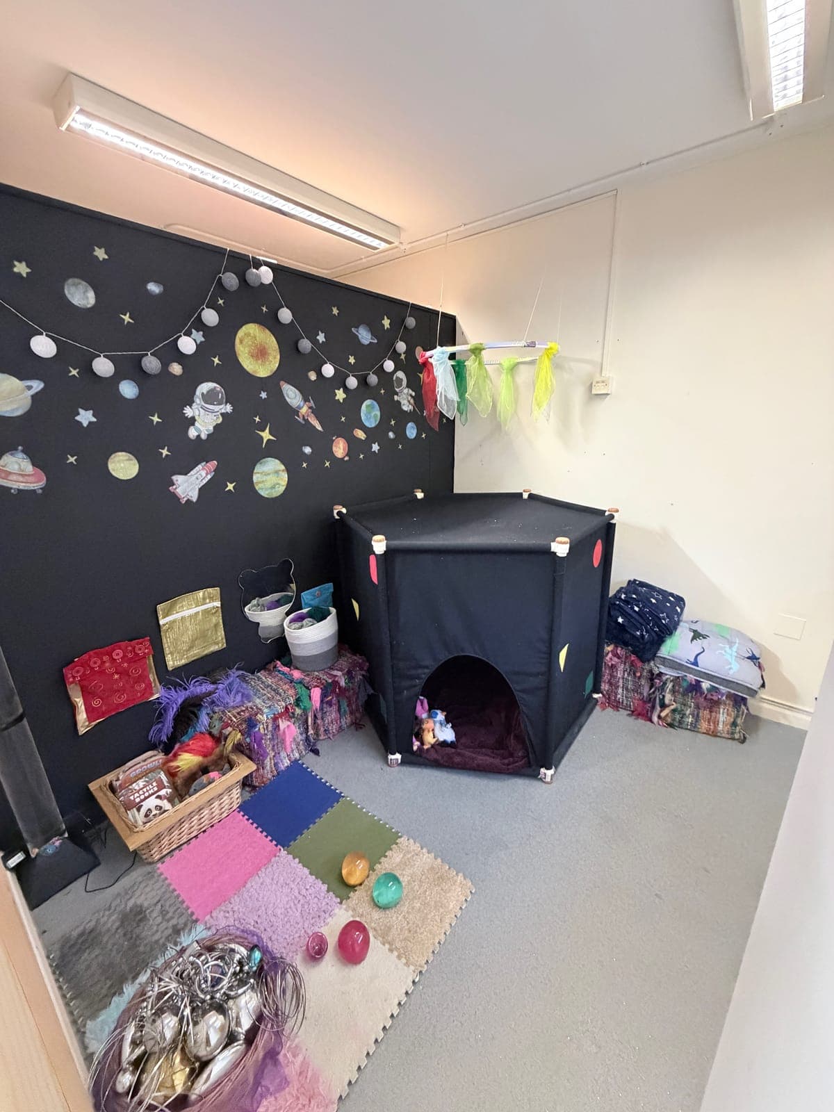 Children in one of our SEN nurture rooms with sensory equipment